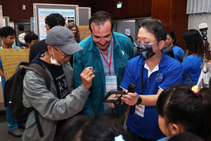 Competition teams presenting their outcomes and engaging in exchange